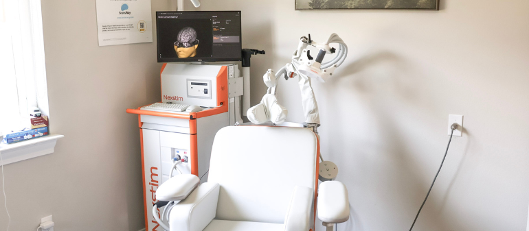 Nextim TMS machine used for non-invasive TMS therapy session at VASAV Health